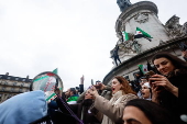 Celebrations in Paris after Syrian rebels capture Damascus and overthrow al-Assad