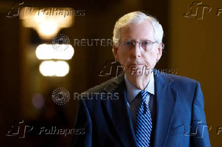 Senate Minority Leader Mitch McConnell walks to the Senate floor for a vote on Capitol Hill in Washington