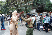 Kenyan activists and civil society representatives gather to deliver a list of people who disappeared during demonstrations against the government proposed tax hikes, in Nairobi