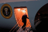 U.S. President Joe Biden and first lady Jill Biden walk boards Air Force One as he departs for Joint Base Andrews from John F. Kennedy International Airport in New York