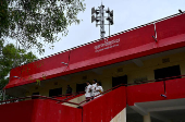 Volunteers descend a tsunami warning centre, during a mock drill to prepare against tsunami, ahead of the 20th anniversary of the