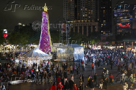 People visit a Christmas theme park in New Taipei City