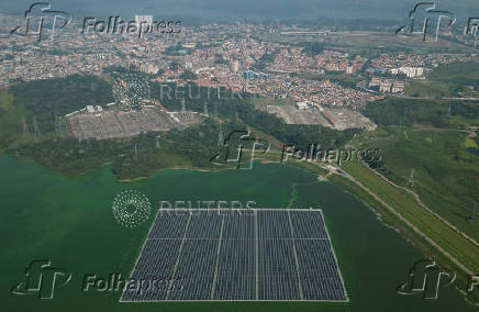 FILE PHOTO: Brazil?s biggest floating solar plant is seen in drone shot at the Billings dam developed by Empresa Metropolitana de Aguas e Energia in Sao Paulo