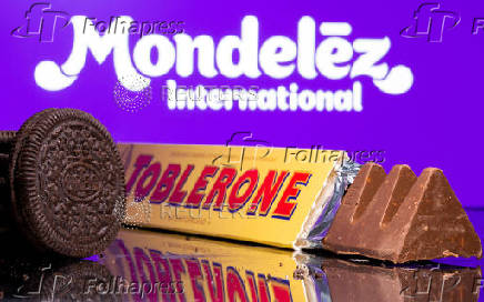 FILE PHOTO: Oreo biscuits and a Toblerone Swiss milk chocolate are seen displayed in front of Mondelez International logo in this illustration picture