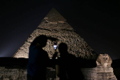 Giza Pyramids are lit up for World Tourism Day on the outskirts of Cairo