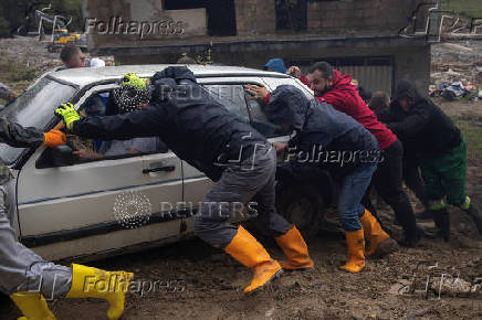 Aftermath of deadly floods and landslides in a village of Trusina