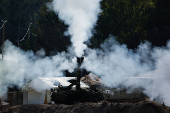 Israeli military vehicles manoeuvre inside the Gaza Strip, in southern Israel