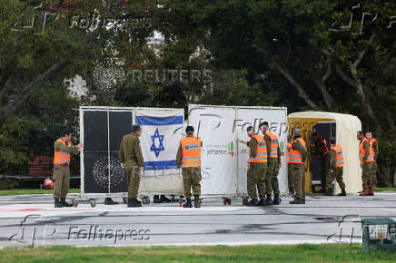 Soldiers prepare a helipad, ahead of the expected arrival of released Israeli hostages, who have been held in Gaza since the deadly October 7, 2023 attack by Hamas, in Petah Tikva