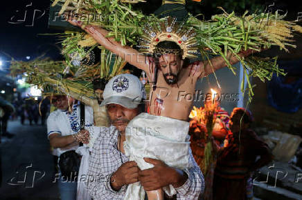 Catholics participate in the Los Cristos Procession in Izalco