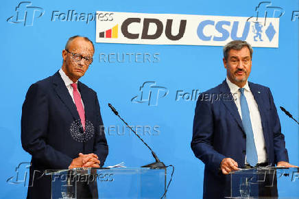 Bavarian State Prime Minister Soeder of the CSU and CDU leader Friedrich Merz hold a press conference, in Berlin