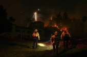 Firefighters battle the Sunset Wildfire in Los Angeles, California