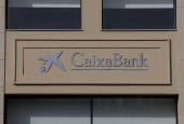 The logo of CaixaBank is seen at a CaixaBank bank branch office, in Malaga