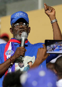 FILE PHOTO: Former Liberian warlord Prince Johnson delivers a speech during a presidential campaign rally in Monrovia