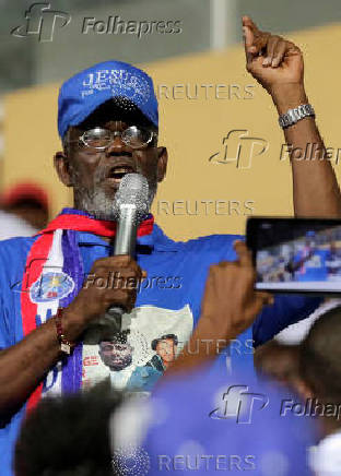 FILE PHOTO: Former Liberian warlord Prince Johnson delivers a speech during a presidential campaign rally in Monrovia