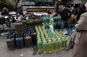 Containers filled with fuel sold on the black market in Damascus