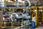 Staff work inside Kendal Power Station