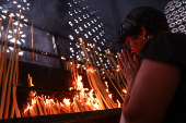 People pay homage to Brazil's patron saint at Cathedral Basilica of the National Shrine of Our Lady Aparecida