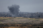 Smoke billows in the Gaza Strip, amid the ongoing conflict between Israel and Hamas, as seen from southern Israel