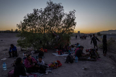 Migrants arrive at an encampment along the Rio Grande river in Ciudad Juarez