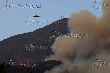 Airport Fire burns in the hills of Orange County