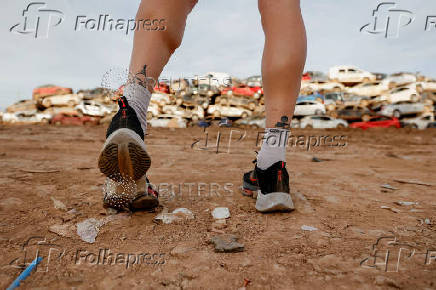 Flood-affected residents share opposite views on the Valencia marathon