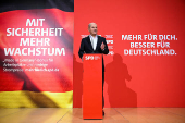 German Chancellor Olaf Scholz speaks to the media in a press statement, ahead of the annual kick-off meeting of the Social Democratic Party of Germany (SPD), in Berlin