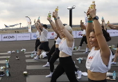 Brew Yoga exercise at Thailand's airport runway