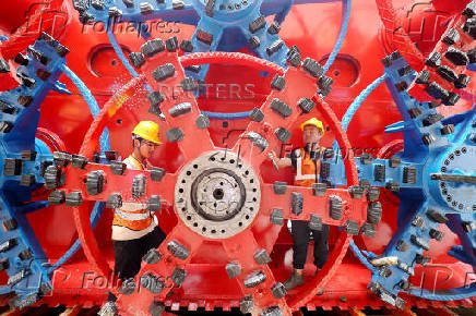 China Railway workers at the construction site of an underground railway station in Huzhou