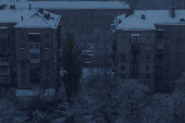 A window is illuminated in a residential building during power outages in Kyiv