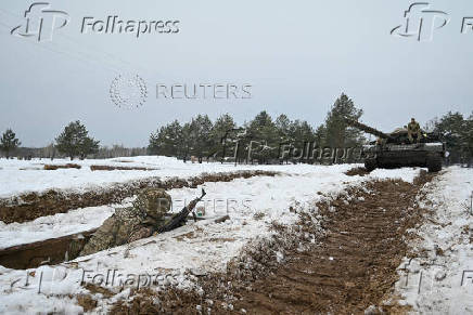 FILE PHOTO: Ukrainian service members attend military exercises in Chernihiv region