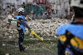 Syrian Civil Defense team clears unexploded ordnance in Idlib countryside