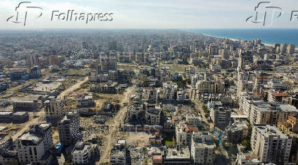 A drone view shows damaged and destroyed buildings, following a ceasefire between Israel and Hamas, in Gaza City