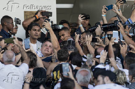 O presidente Jar Bolsonaro durante chegada ao estdio Vila Belmiro, em Santos (SP)