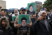 Iranians mourn the death of Lebanon's Hezbollah leader Nasrallah, in Tehran