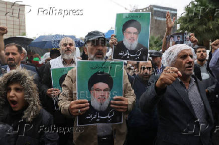 Iranians mourn the death of Lebanon's Hezbollah leader Nasrallah, in Tehran