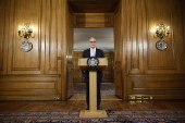 British Prime Minister Starmer holds press conference on migration in London