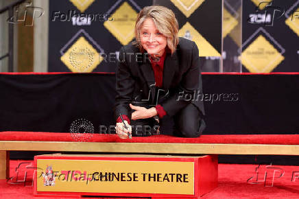 Actor Jodie Foster places her handprints in cement at the forecourt of the TCL Chinese Theatre, in Los Angeles