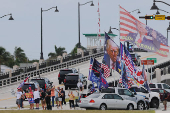 The motorcade carrying U.S. President-elect Trump departs Palm Beach