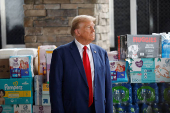 Republican presidential nominee Donald Trump and Georgia Governor Brian Kemp speak to the press about the impact of Hurricane Helene, in Evans