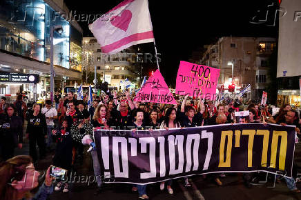 People rally demanding the release of hostages kidnapped during the deadly October 7, 2023 attack, in Tel Aviv