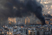 Smoke billows in Beirut's southern suburbs, after an Israeli strike