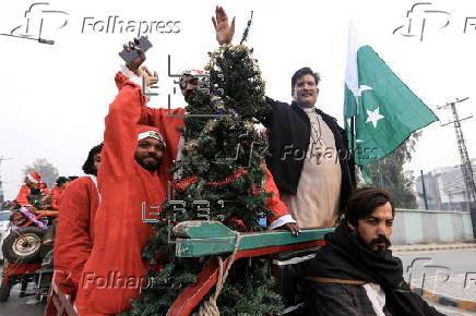 Pakistan's Christian minority dressed up as Santa hold rally in Peshawar