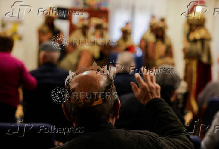 The Three Wise Men visit children and elderly people, ahead of the Epiphany parade, in Ronda