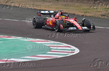 Lewis Hamilton drives a Ferrari F1 car around the Fiorano circuit as part of the TPC tests.