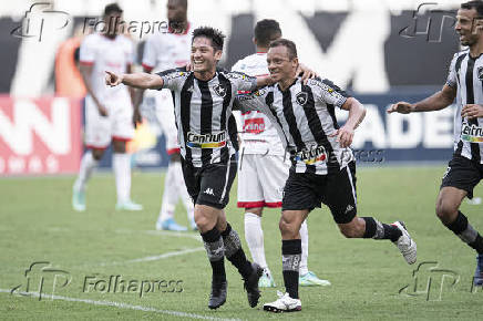 Lus Oyama jogador do Botafogo comemora seu gol durante partida contra o Nutico