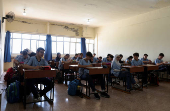 Students attend a class in Al Carmelia School in Mejdlaya