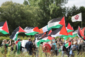 People protest in solidarity with Palestinians in Gaza near the Shannon Airport