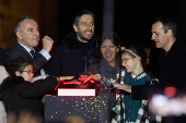 Paris Olympics chief Estanguet turns on Christmas lights on the Champs Elysees