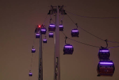 A view of the cable cars at the Royal Docks during foggy weather in London