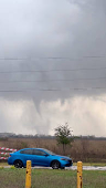 A tornado crosses a field in Katy, Texas